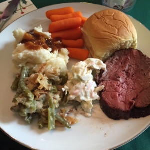 A fabulous Christmas lunch of beef tenderloin, mashed potatoes, carrots, green bean casserole, and the ever present potato roll at Grandma's 
